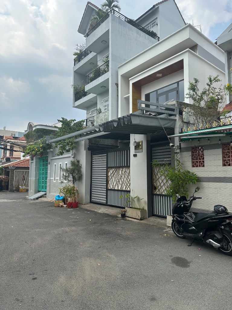 Bán nhà Trần Xuân Soạn, Quận 7, 148m², 3 tầng, 4PN, hẻm rộng 7m, xe hơi ngủ trong nhà, giá 15,5 tỷ